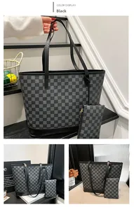 Detail of checkered pattern tote bag and matching pouch in classic black grey tones