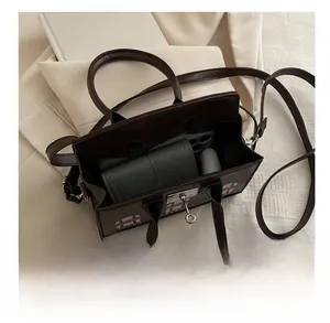 Top view of brown crocodile texture bag showing interior capacity for phone and wallet