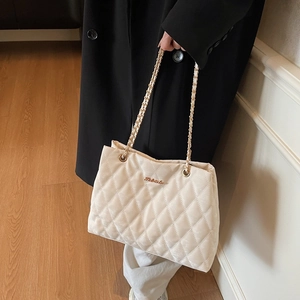 Elegant cream quilted shoulder bag with gold logo and metal chain strap for women