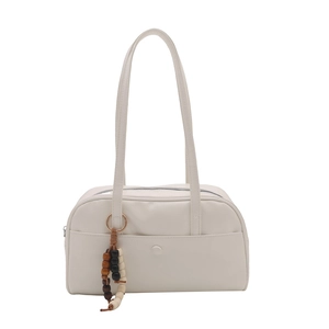 Minimalist beige faux leather satchel bag with a bohemian beaded charm and double handles