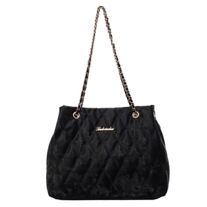Classic black quilted velvet tote bag with gold chain strap and elegant brand logo