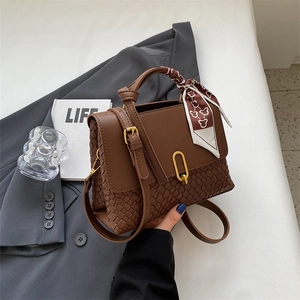 Chic dark brown woven leather handbag with gold U-lock and decorative silk scarf handle
