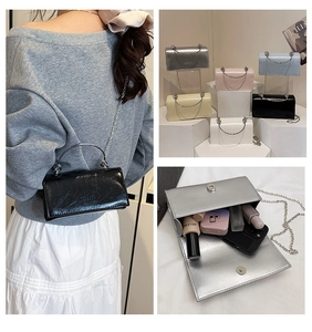 Detail showing various colors of the fashion chain bag and its interior storage capacity