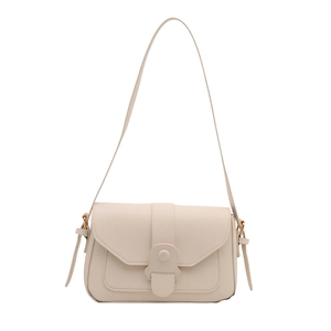 Minimalist cream white crossbody bag with round buckle and flap closure on white background