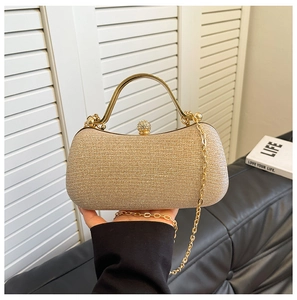Elegant champagne gold sequin evening bag with crystal lock and chain strap