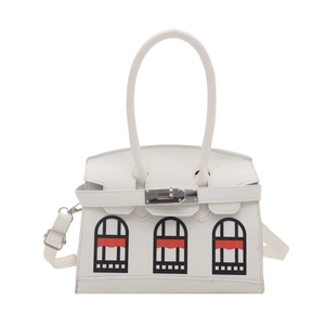 White crocodile embossed tote bag featuring a creative building facade window design