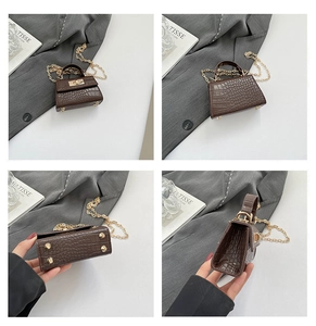 Detailed views of the brown crocodile pattern mini bag with gold twist lock and chain