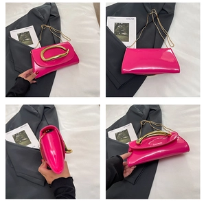 Detail view of pink patent leather handbag featuring a large gold oval metal handle