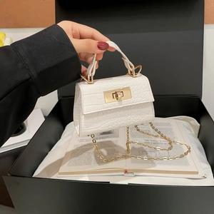 White crocodile-textured mini handbag with gold metal lock and chain strap for women