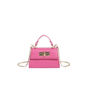 Pink croc-embossed mini flap bag with gold twist lock and fine chain shoulder strap