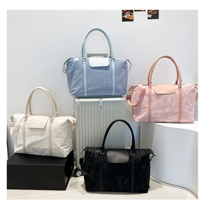 Nylon travel tote bags in four colors with leather flaps and detachable straps