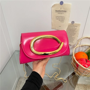Fashionable rose pink glossy crossbody bag with gold oval buckle and chain strap