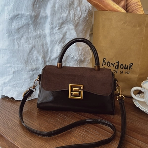 Frosted brown leather crossbody bag with square metal lock and vintage top handle design