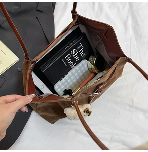 Top view of spacious leopard tote bag showing internal storage for tablets and books