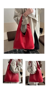 Detail view of large red leather hobo shoulder bag showing soft texture and spacious design