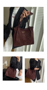 Detail of dark coffee tote bag with woven rope handle and metallic brand lettering