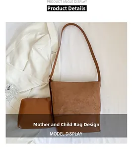 Macro detail of dark brown 2-in-1 suede bucket bag with matching zipper pouch set