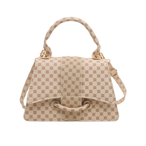 Chic cream clover print handbag with gold hardware and detachable shoulder strap for women