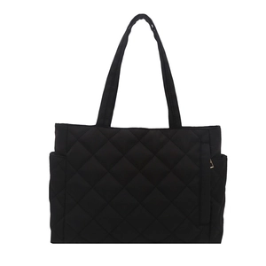 Minimalist black quilted tote bag for women with light nylon material and side pockets