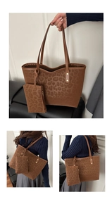 Detail of vintage brown leopard print tote bag set with metal rivets and shoulder straps