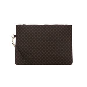 Brown rectangular clutch with geometric prints and gold hardware on white backdrop