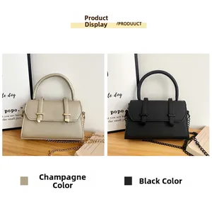 Detail of champagne and black mini bags featuring cross-grain texture and metal chain