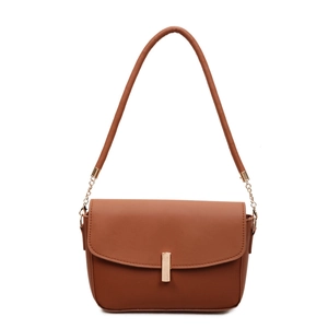 Minimalist brown leather shoulder bag with gold metal clasp and adjustable strap
