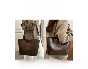 Dual-use dark brown tote bag shown as a handbag and shoulder bag for daily office commute