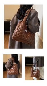 Detailed view of a brown puffer handbag with diamond quilting and fashion label
