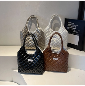 Detailed display of four color options for the quilted down tote bag with diamond stitching