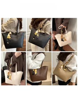 Multiple views of large contrast-color leather tote bag with decorative handle scarf