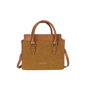 Sac à bandoulière rétro bicolore en cuir marron texturé avec typographie dorée chic