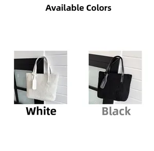 Detail of soft fleece tote bags in white and black with matching leather handles