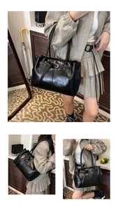 Close-up of elegant black tote bag with glossy finish and decorative metal buckle detail