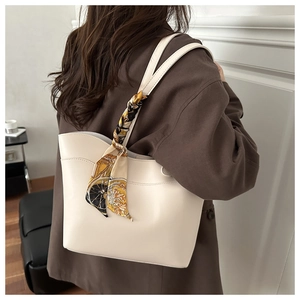 Minimalist cream tote bag with elegant vintage horse print silk scarf accessory