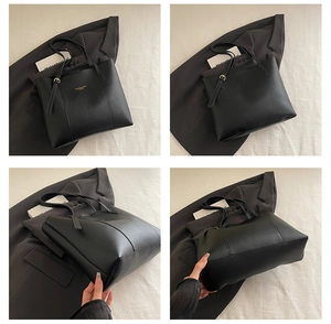Detail shots of black leather tote bag with gold lettering and spacious interior design