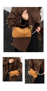 Macro detail of camel suede and brown leather texture with golden metal hardware