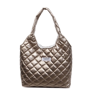 Minimalist metallic quilted tote bag with bronze finish and fashion instinct brand label