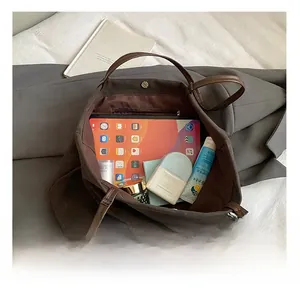 Deep coffee large tote bag interior showing spacious storage for tablet and cosmetics