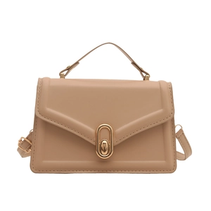 Minimalist khaki leather handbag with gold oval clasp and adjustable strap for women