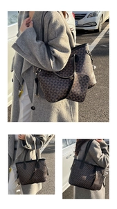 Detail of vintage patterned tote bag set with matching pouch in outdoor street setting