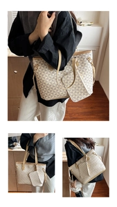 Detail of geometric triangle pattern tote bag with matching pouch and zip closure