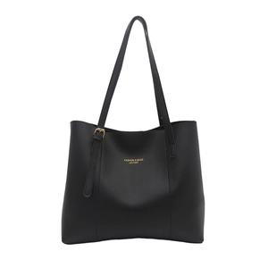 Minimalist black leather tote bag with large capacity and gold fashion lettering