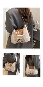 Detail view of the vintage canvas shoulder bag featuring leather flap and retro print