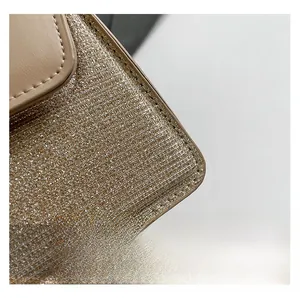 Detail showing high-quality stitching on apricot leather and golden glitter fabric mix