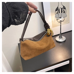 Retro underarm shoulder bag in brown suede and dark coffee leather with gold rings