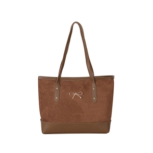 Sac cabas en daim marron avec garniture en cuir et détail nœud doré pour le quotidien