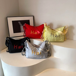 Fashionable nylon crossbody tote bags for women in red, yellow, black and grey colors