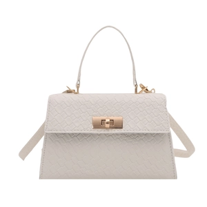 White crocodile pattern square handbag with gold twist lock and shoulder strap