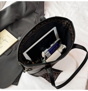 Top-down view of a printed tote bag showing spacious interior with daily essentials